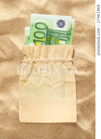 One hundred euro banknotes in linen sack One hundred euro banknotes in linen sack 27461968