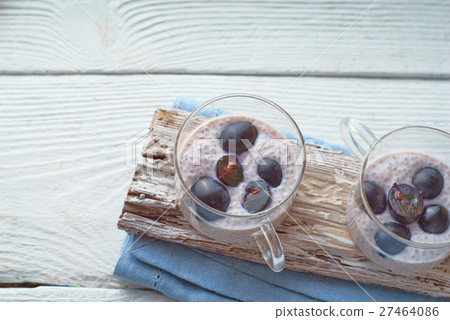 Chia pudding with grapes on the white table  27464086