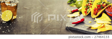 Mexican nachos chips and tacos  27464133