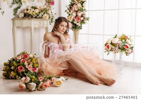 Beautiful girl at the flower interior Beautiful girl at the flower interior 27465401