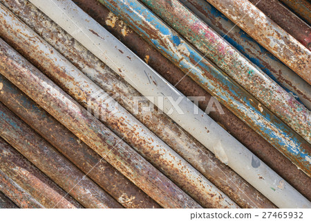 dirty and rusty old pipes stack texture background 27465932