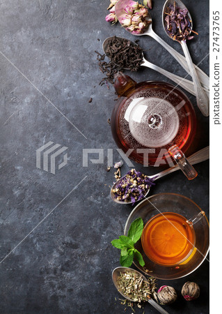 Tea cup, teapot and assortment of dry tea Tea cup, teapot and assortment of dry tea 27473765