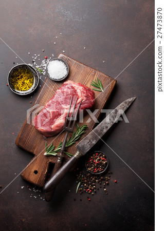 Raw ribeye beef steak cooking with ingredients 27473870