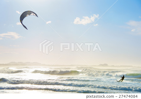 Kite surfing in the ocean 27474084