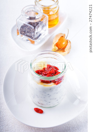 Yoghurt with goji berries, chia seeds and honey 27474221