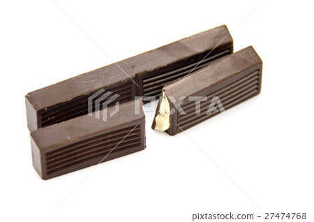 Dark chocolate with milk filling isolated on white Dark chocolate with milk filling isolated on white 27474768