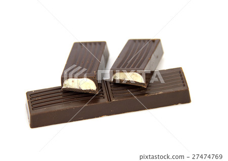 Dark chocolate with milk filling isolated on white Dark chocolate with milk filling isolated on white 27474769