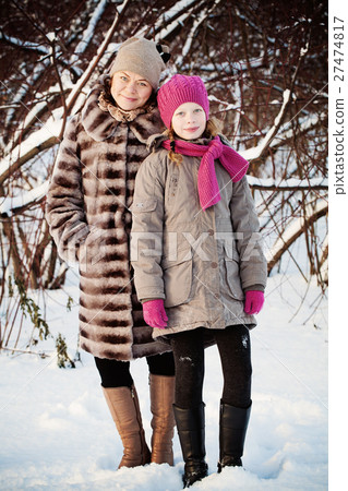 Happy Child Girl in Pink Winter Hat Outdoors Happy Child Girl in Pink Winter Hat Outdoors 27474817