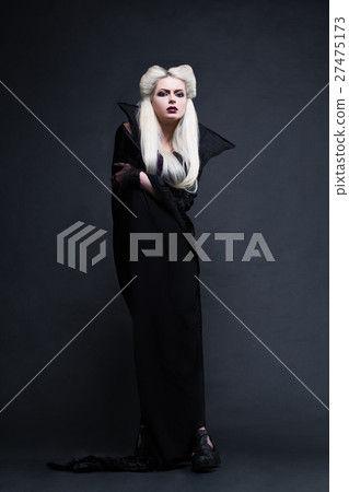 Beautiful blonde girl vampire standing 27475173