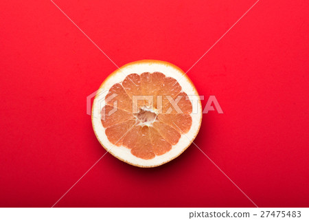grapefruit with red background 27475483