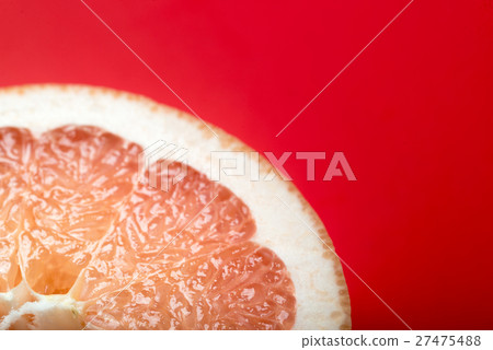 grapefruit with red background grapefruit with red background 27475488