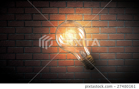 Light bulb on brick surface Light bulb on brick surface 27480161