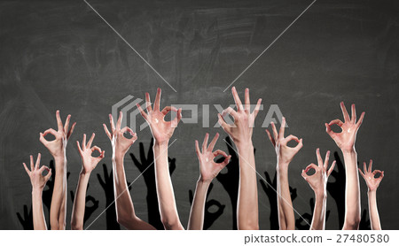 Group of people rise hands 27480580
