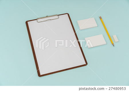 Clip board, paper,pencil and business card on blue background . Clip board, paper,pencil and business card on blue background . 27480953