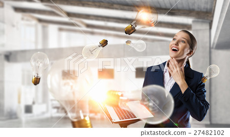 Elegant businesswoman thinking something over 27482102