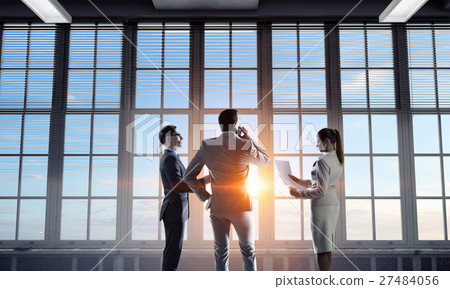 Businessteam facing new day 27484056