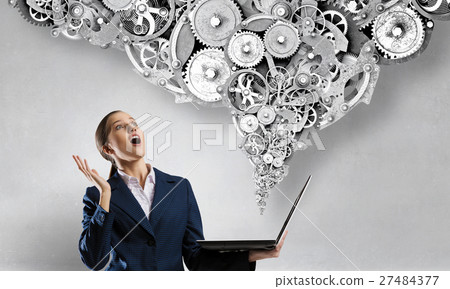 Woman with laptop in hands Woman with laptop in hands 27484377