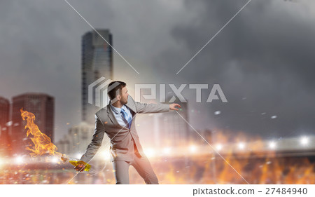 Businessman throwing petrol bomb Businessman throwing petrol bomb 27484940