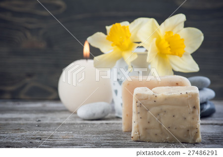 Organic soap and yellow flowers Organic soap and yellow flowers 27486291