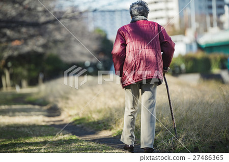 Senior woman using walking stick 27486365