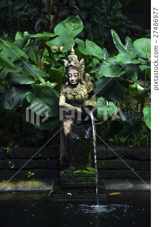 thai statue in a garden thai statue in a garden 27486977