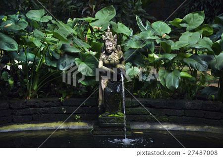 thai statue in a garden 27487008
