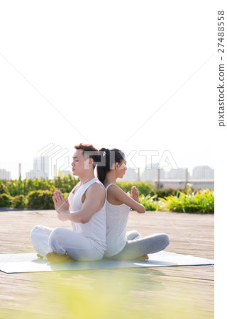 Meditating couple Meditating couple 27488558