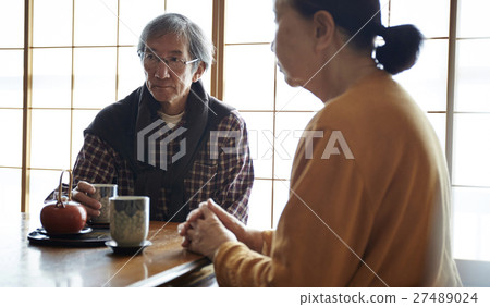 Two people living a crowded old elderly crowd 27489024