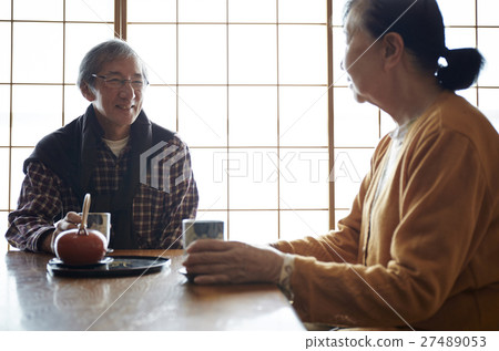 Two people living a crowded old elderly crowd 27489053