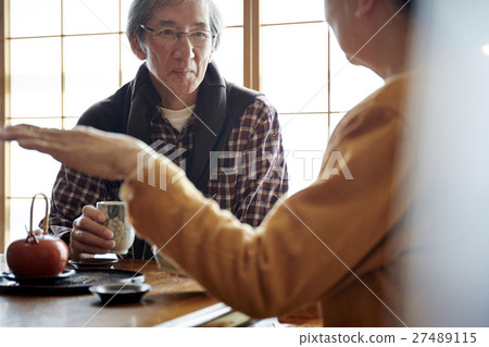 Two people living a crowded old elderly crowd 27489115