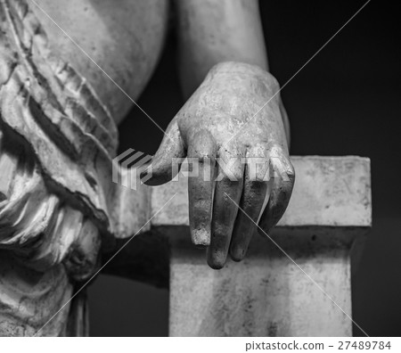 stone statue detail of human hand 27489784
