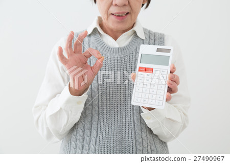 Senior white back with a calculator Senior white back with a calculator 27490967