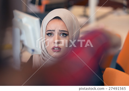 Worried arabic businesswoman wearing hijab 27491565