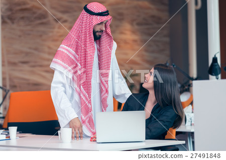 Multi ethnic business people at work in modern 27491848