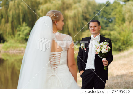 Bride and groom on the walk 27495090