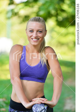 Young girl stretching outdoors. Jogging - workout Young girl stretching outdoors. Jogging - workout 27496188