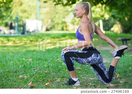 Young girl stretching outdoors. Jogging - workout Young girl stretching outdoors. Jogging - workout 27496189