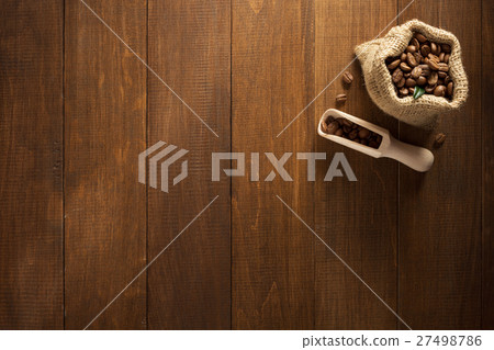 coffee beans in bag on wood 27498786