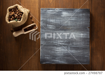 coffee beans in bag on wood 27498787