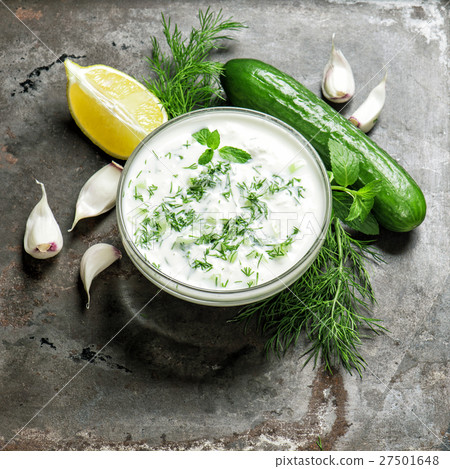 Tzatziki sauce herbs vegetables. Healthy appetizer 27501648