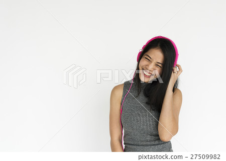 Cheerful Girl Standing Listen Music Headphones Concept Cheerful Girl Standing Listen Music Headphones Concept 27509982