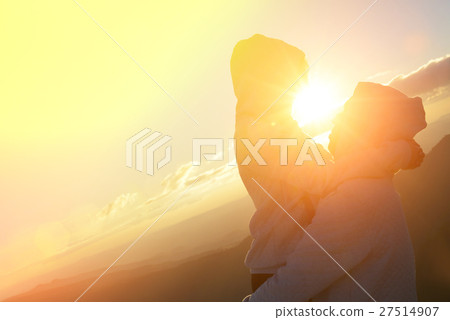 Silhouette of couples happy at scenic mountain fog Silhouette of couples happy at scenic mountain fog 27514907