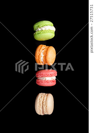 Multicolored macaroons isolated on black 27515731