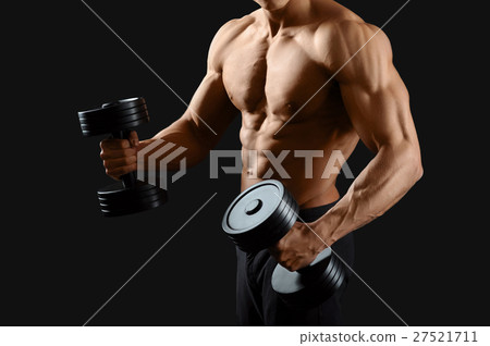 Male bodybuilder posing in studio Male bodybuilder posing in studio 27521711