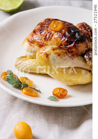 Fried chicken with kumquats 27521946