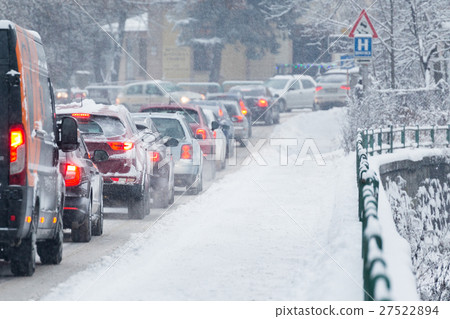 Traffic jam in the middle of winter. Snow calamity 27522894