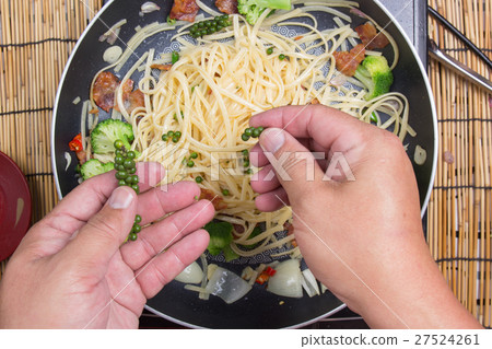 Chef putting green pepper for cooking Chef putting green pepper for cooking 27524261
