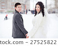 Winter wedding, bride and groom holding hands 27525822