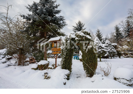 beautiful winter garden covered by snow beautiful winter garden covered by snow 27525906