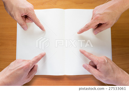 Hands pointing at notebook Hands pointing at notebook 27533061